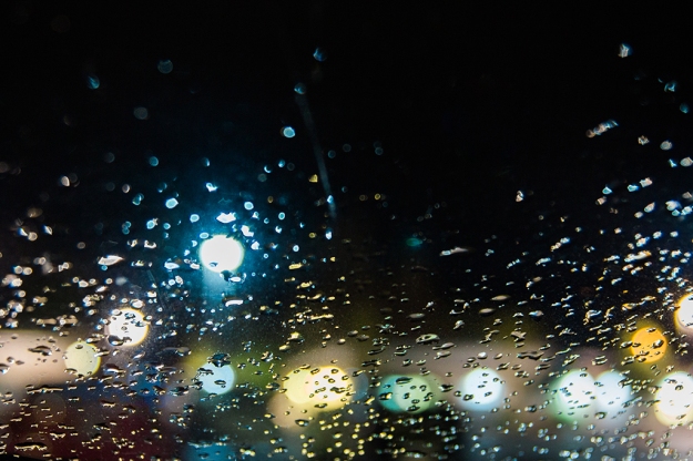 Lights and Rain Drops 5-7-16 1:30 a.m. Rexburg, Idaho 31 mm f/2.8 1.6 sec Steadied camera on dashboard of car